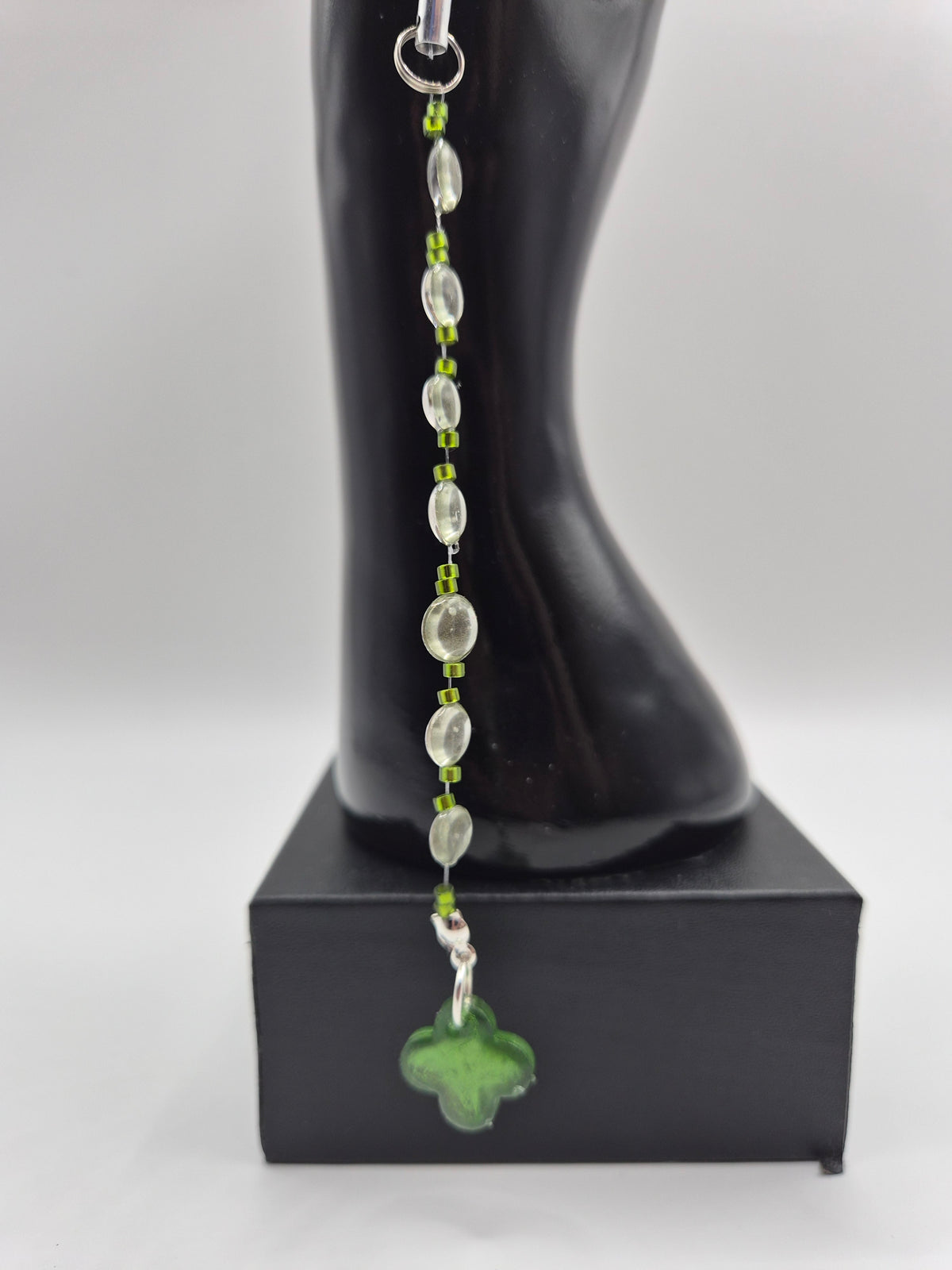 Bijoux téléphone "Trèfle d'eau"