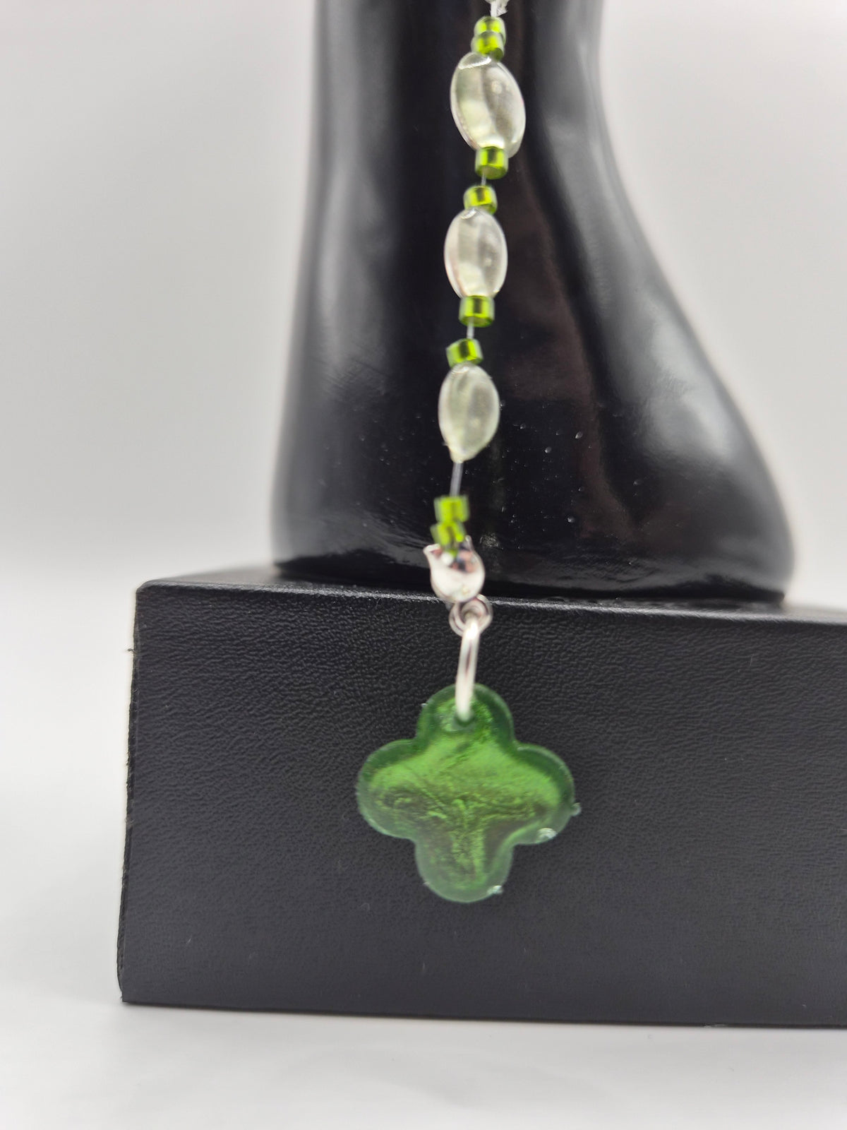 Bijoux téléphone "Trèfle d'eau"