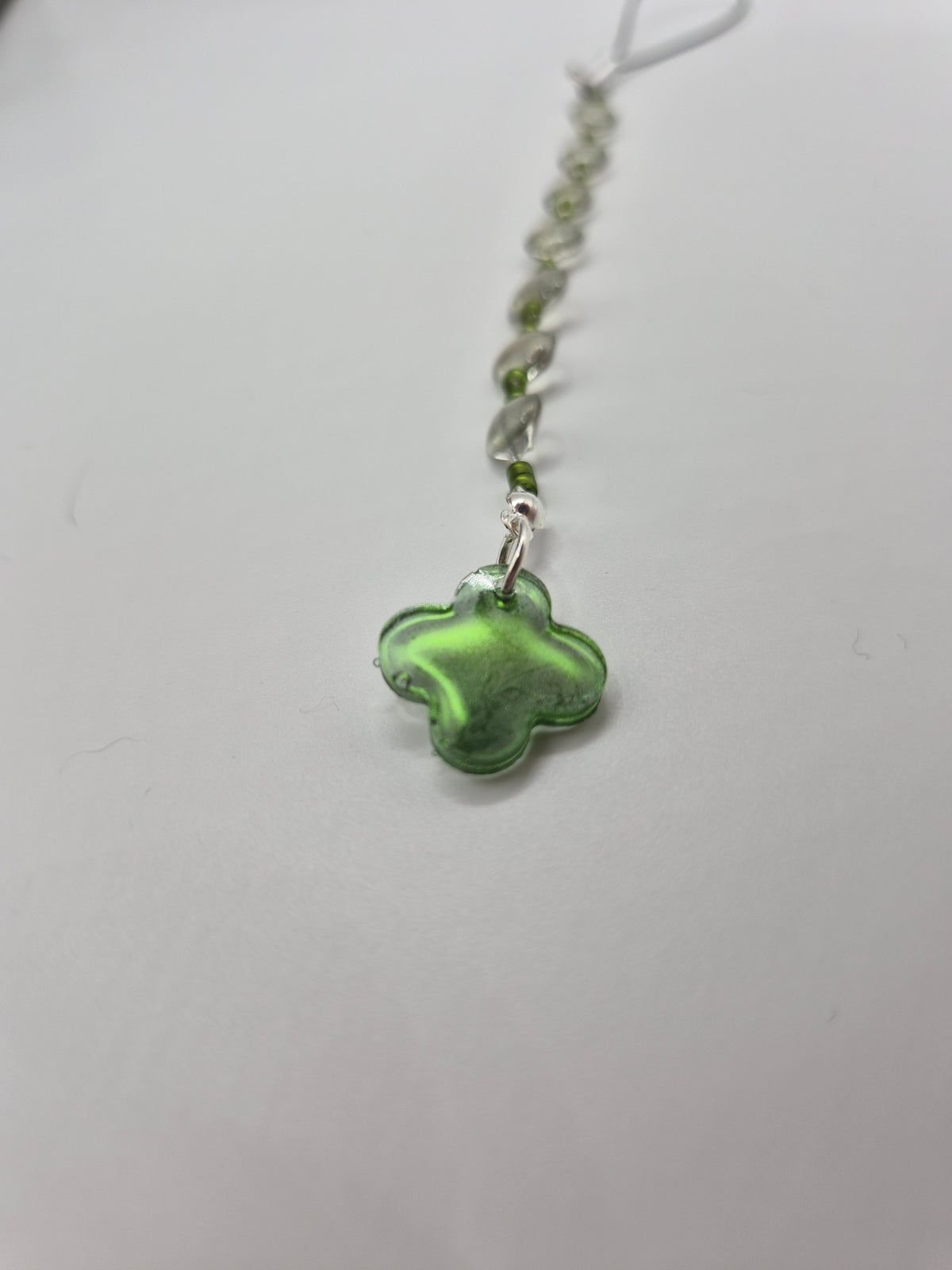 Bijoux téléphone "Trèfle d'eau"